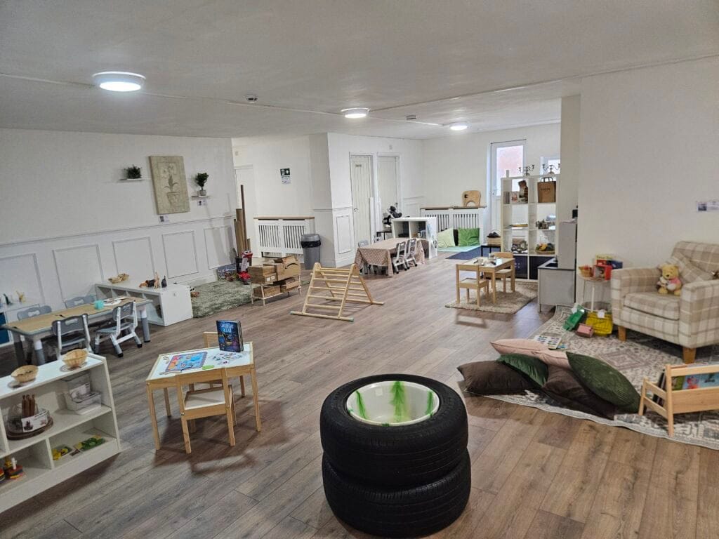 Calm nursery playroom in Leyton with natural learning areas