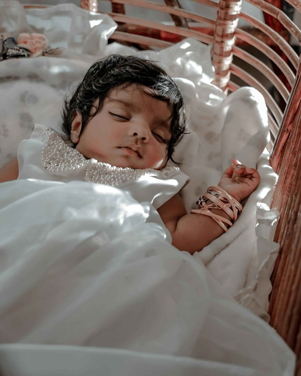 Baby sleeping peacefully at nursery as part of healthy rest routine