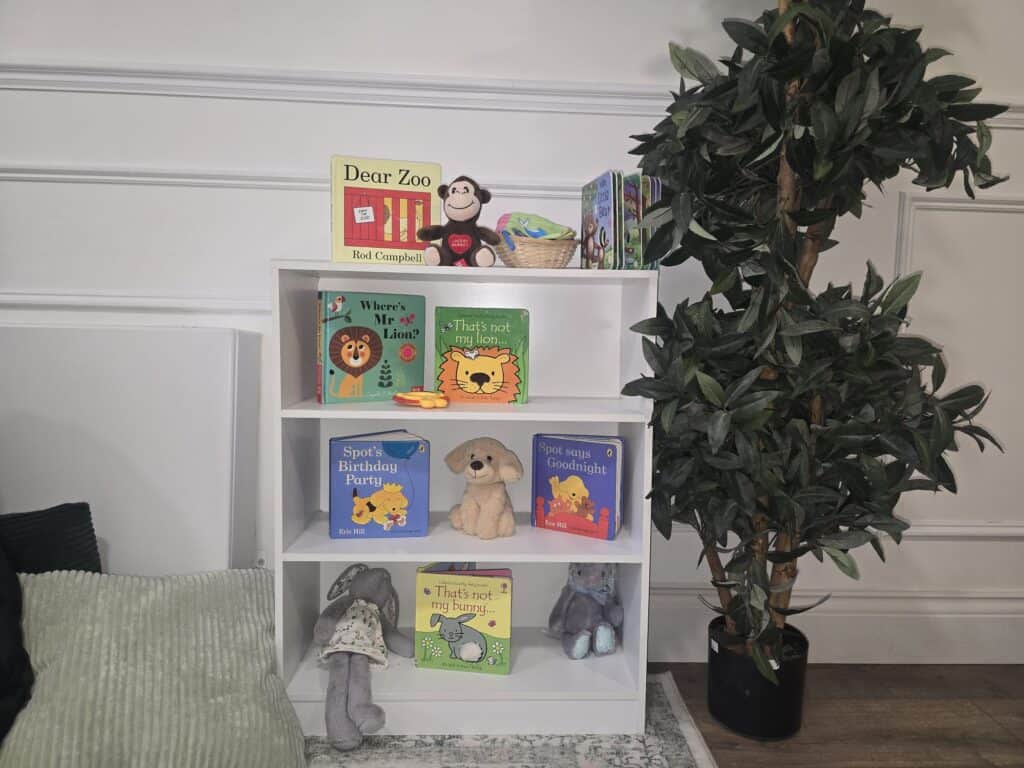 Cosy under-2s nursery reading corner in Leyton with books and soft play resources